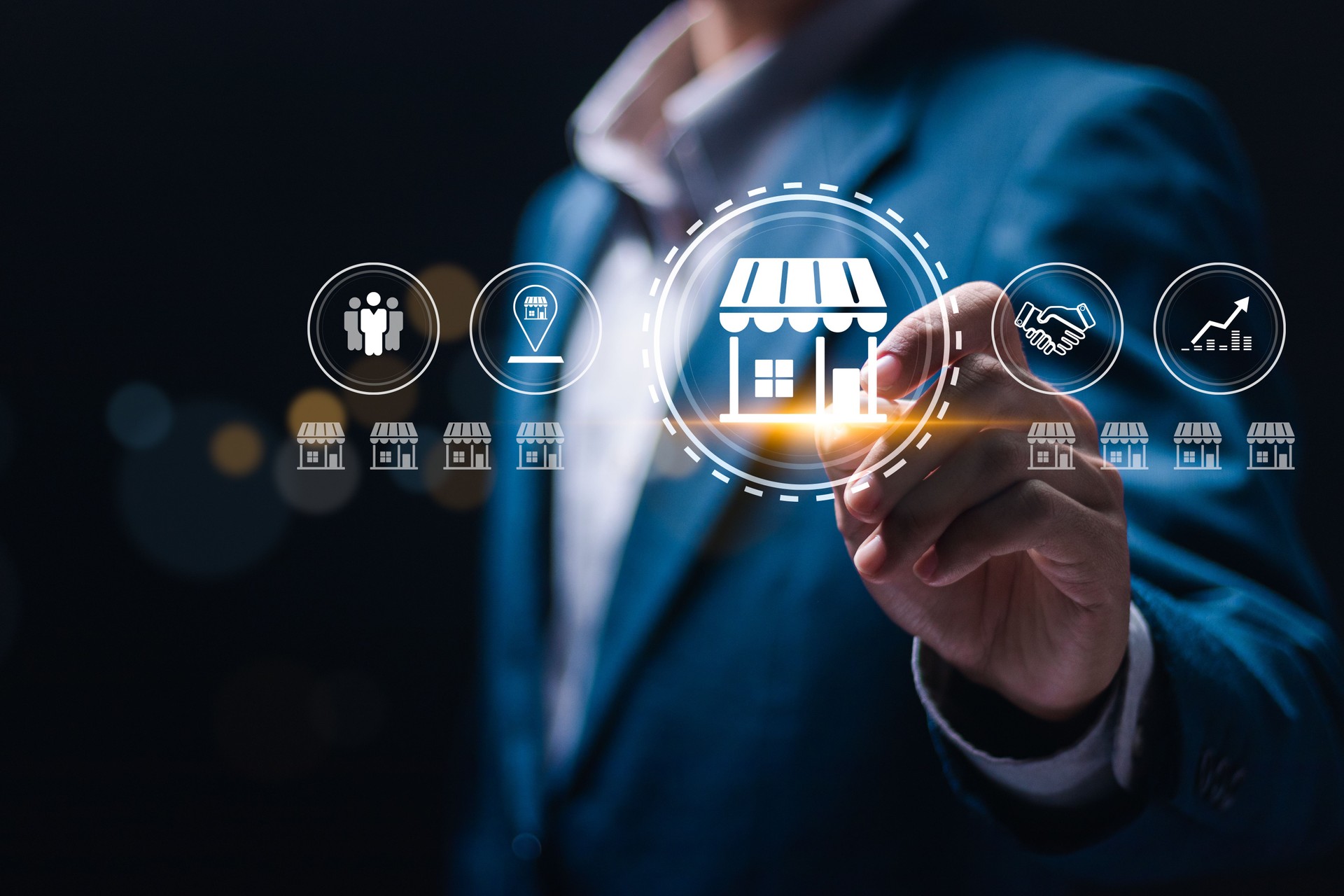Franchise business concept, Businessman touching virtual franchise business icon for franchise network business marketing plan for branch growth and expansion.